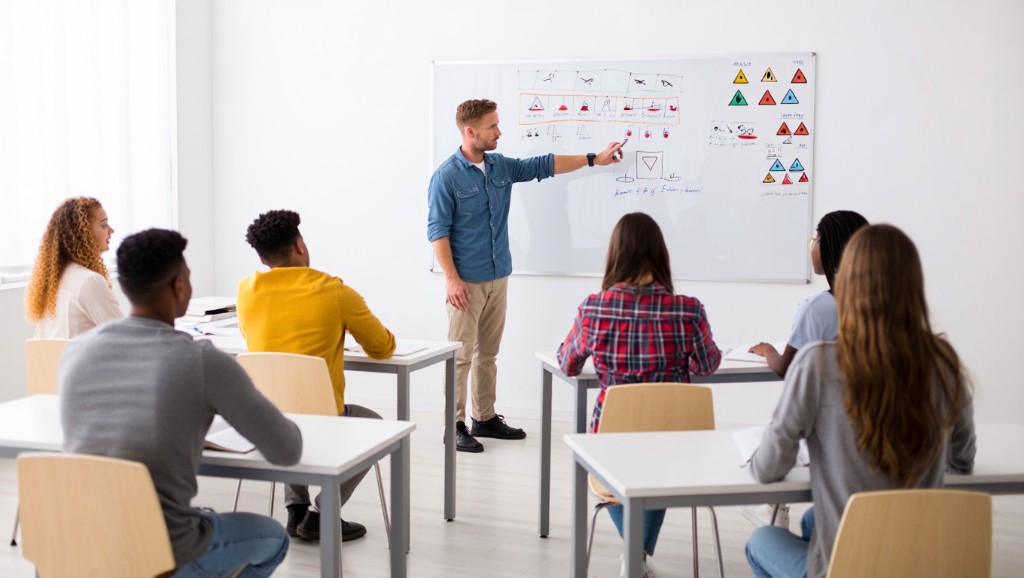 Road awareness course classroom in Fribourg Switzerland — instructor and students